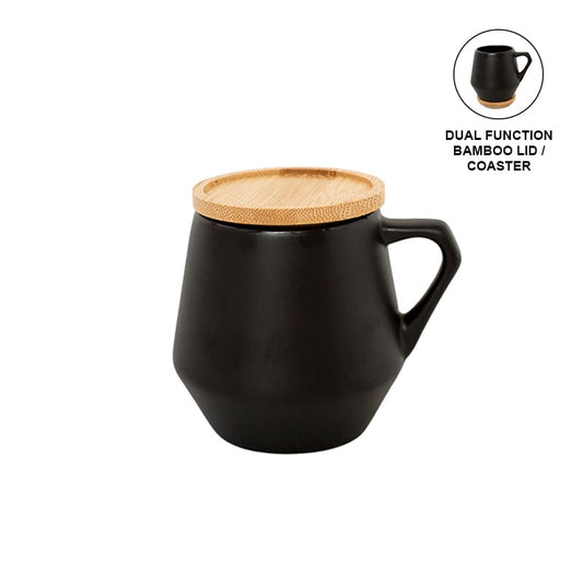 A black ceramic mug with a natural bamboo lid on a white background. The mug is depicted in a vertical orientation with the handle on the right side, and there is a small inset image showing the mug filled with a beverage.